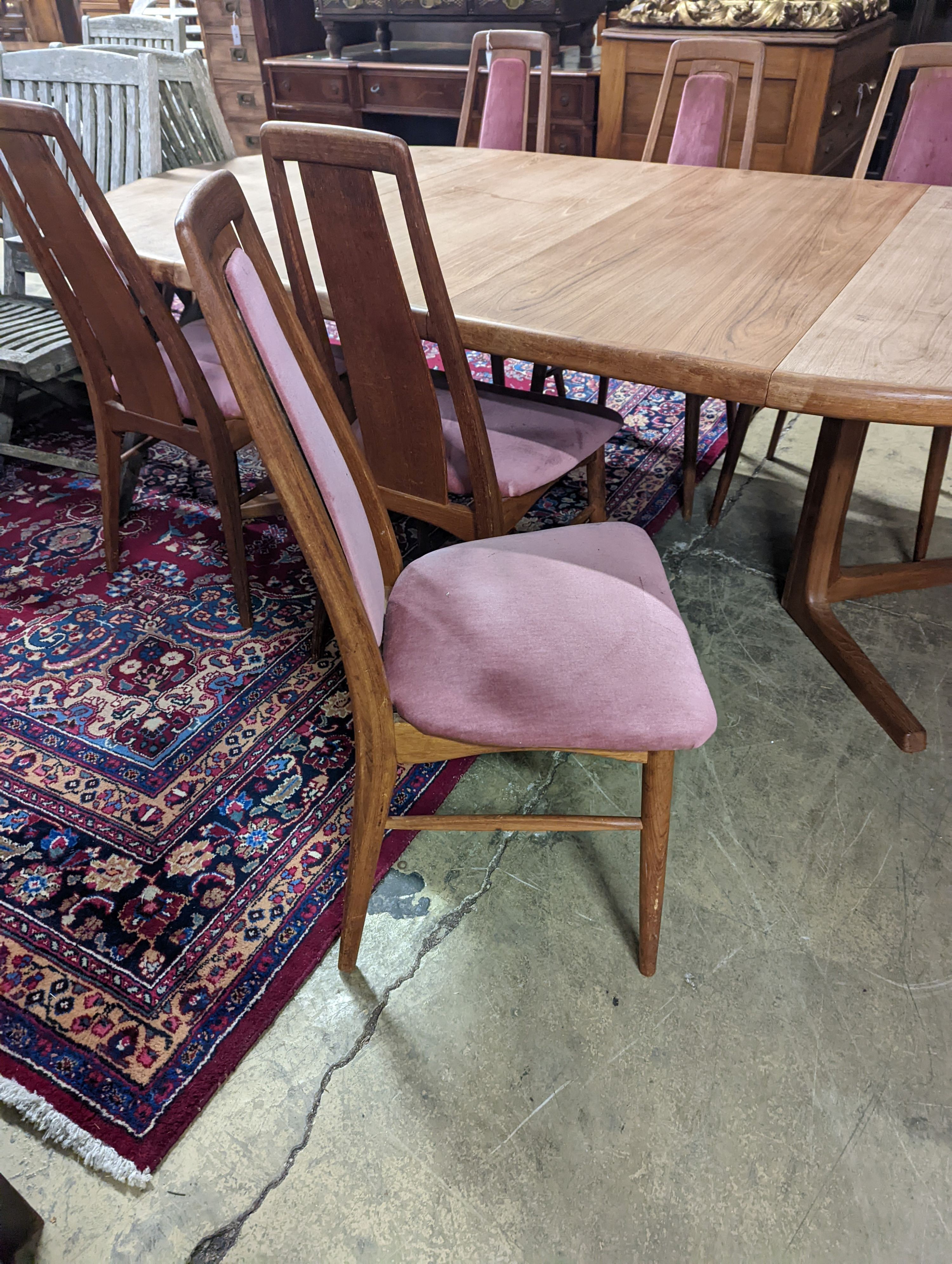 A set of six Niels Koefoed teak dining chairs and circular Danish teak dining table, 220cm extended, two spare leaves, depth 120cm, height 73cm